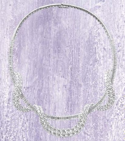 null A Diamond Necklace circa 1960 Designed as a baguette-cut Diamond line, the front...