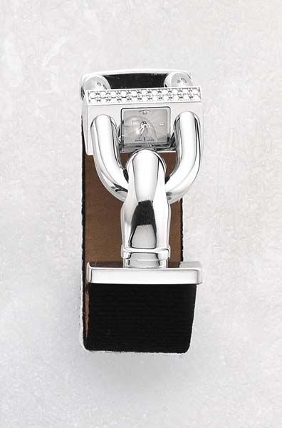 null A Diamond and Gold Wrist watch VAN CLEEF & ARPELS The inclined rectangular dial...