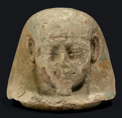 ÉGYPTE BOUCHON DE VASE CANOPE représentant un des fils d'Horus à tête humaine, paré...