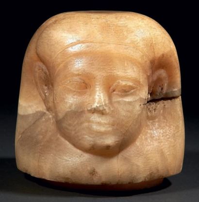 EGYPTE BOUCHON DE VASE CANOPE. Il représente l'un des quatre fils d'Horus, à visage...