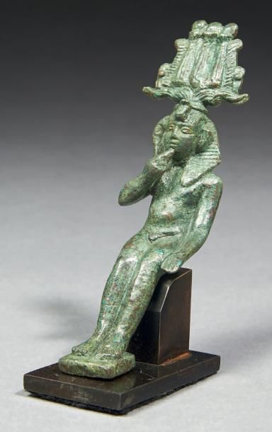 Égypte STATUETTE DE SOMTOUS. Statuette votive représentant le dieu Somtous. Il est...
