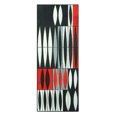 ROGER CAPRON (1920-2006) Table basse à décors de navettes Faïence émaillée rouge,...