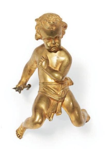 null AMOUR AGENOUILLÉ en bronze doré, tenant une flèche. Fin du XVIIIe siècle - début...