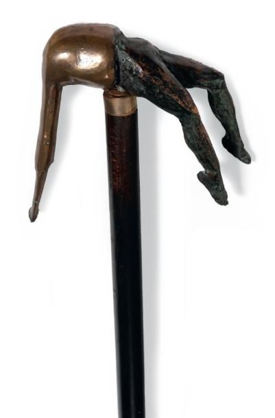 JOSE CHAPELLIER (1946) Hommage à Magritte Canne en bois, le pommeau en bronze en...