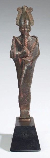 null STATUETTE D'OSIRIS.
Statuette votive représentant le dieu Osiris. Il est debout,...