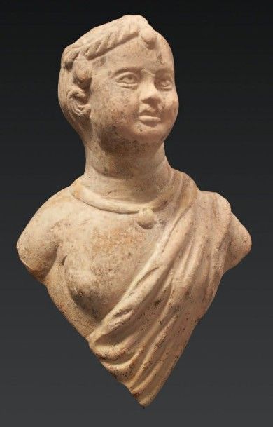 null BUSTE DE JEUNE GARÇON.
Figurine représentant un jeune garçon, l'épaule gauche...