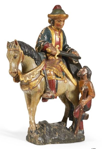 null SAINT MARTIN sculpté en ronde-bosse, polychromé et doré. Assis sur son cheval,...