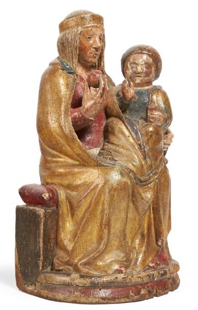 null VIERGE À L'ENFANT en bois fruitier, sculpté, polychromé et doré, dos évidé....