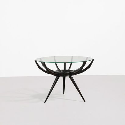 CARLO DI CARLI (1910-1971) 
Table basse modele «Ragno»
Noyer teinté et verre
Vers...