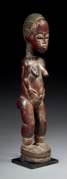 null STATUETTE FÉMININE WAKA SONA, blolo bla ornée de scarifications dont certaines...