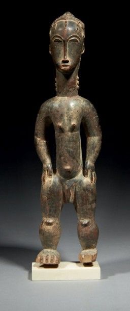 null RARE STATUETTE MASCULINE IRI NE signifiant «petit homme de bois» en langue gouro....