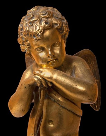 null Paire de putti en bronze doré sur une colonne cylindrique ciselée. Ils reposent...