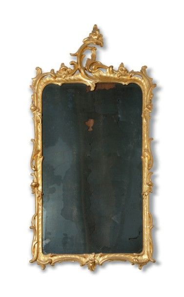 null Paire de miroirs en bois sculpté redoré (accidents).
XVIIIe siècle.
H_112 cm...