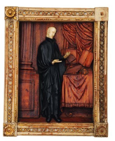 null Bas relief en bois, ébène et ivoire représentant saint Ignace de Loyola. Revêtu...