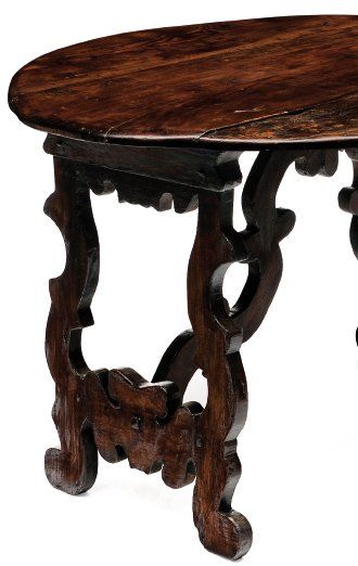 null Table ovale à deux abattants en bois naturel teinté, piétement découpé, entretoise...