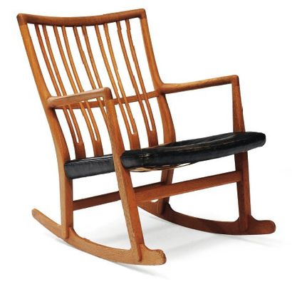HANS J. WEGNER (1914-2007) Fauteuil « Rocking chair » à assise aménagée d'une galette...