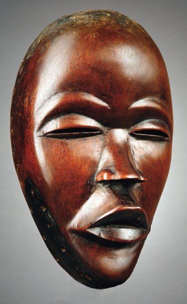 null MASQUE DAN Côte d'Ivoire Bois à patine brune H_26,5 cm Reproduit : L'art africain,...