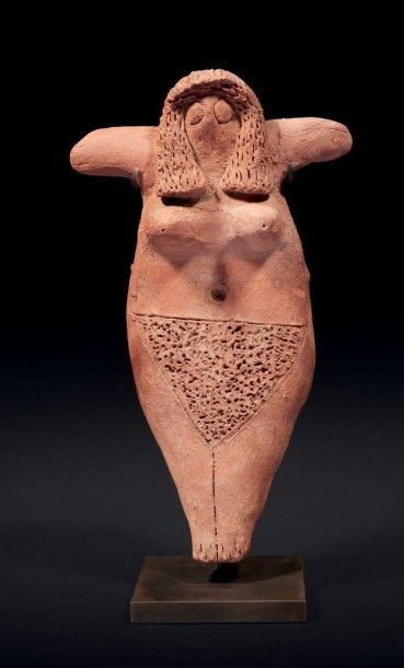 null STATUETTE FÉMININE DE FÉCONDITÉ.
Rare statuette modelée représentant une femme...