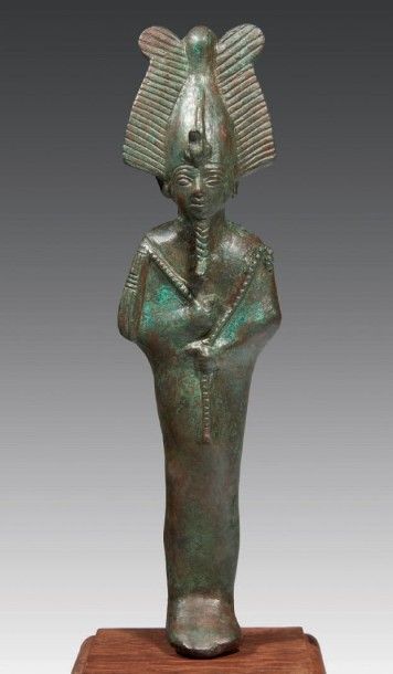 null STATUETTE D'OSIRIS.
Statuette votive représentant le dieu Osiris. Il est momiforme,...