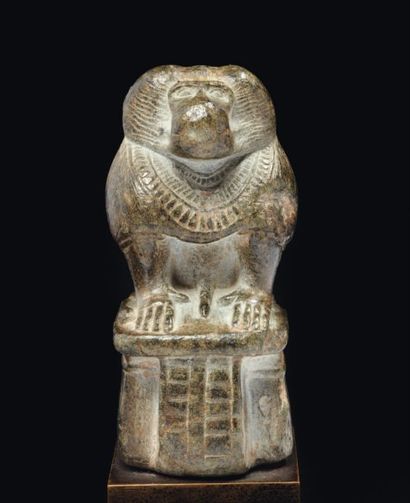 null Figurine représentant le dieu Thot simiesque. Il est sous la forme du babouin...