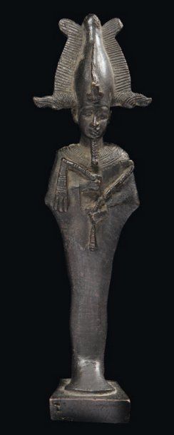 null Statuette votive représentant le dieu Osiris. Il est debout, momiforme, les...