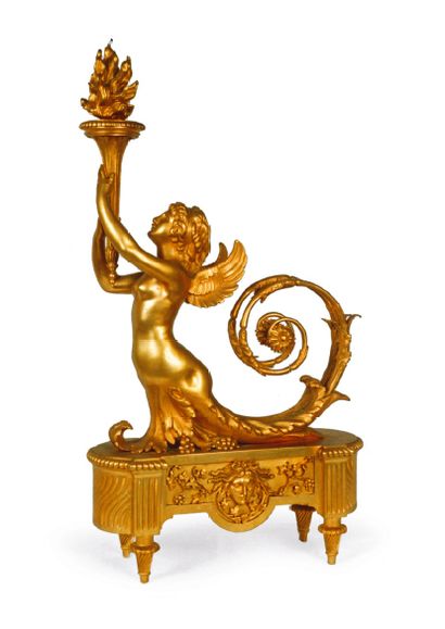 null PAIRE DE CHENETS en bronze doré à décor d'une femme triton, la queue enroulée,...