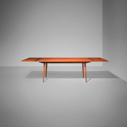 HANS J. WEGNER (1914-2007) Danemark Rare table de salle à manger à allonges Chêne,...