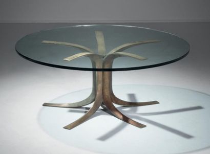 Jules Wabbes (1919-1974) Table basse
Plateau en verre et piétement central à cinq...