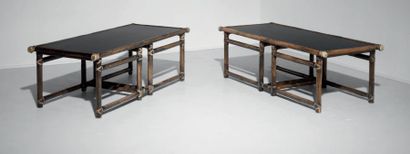 JOHN MC GUIRE Paire de tables basses
Bambou et cuir.
1970
H_42 cm L_126 cm P_54 ...