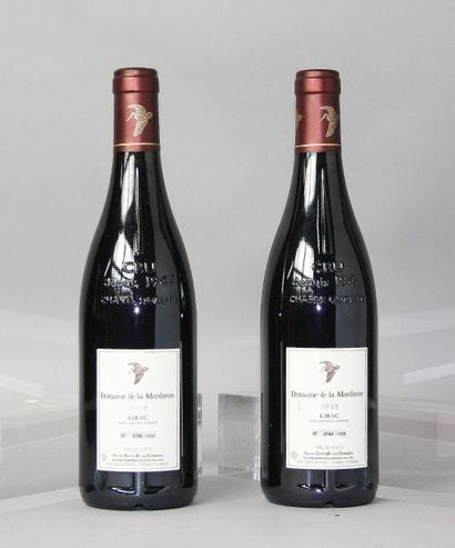 null 2 Bouteilles LIRAC - DOMAINE DE LA MORDOREE 2012 1 étiquette légèrement tachée....