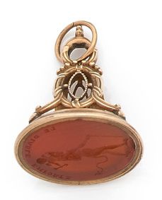 null PENDENTIF en or 18K (750) retenant une intaille en cornaline gravée d'une citation...