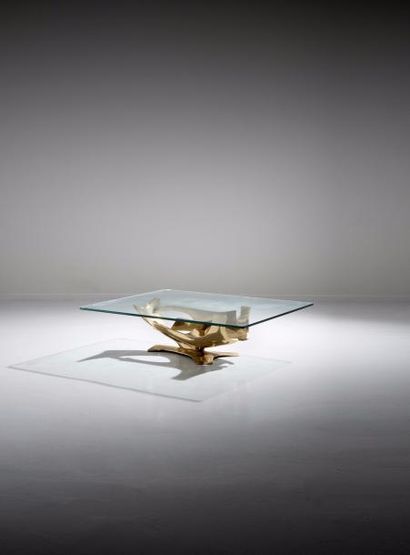 FRED BROUARD (1944-1999) France Table basse Bronze doré et verre Signée «FBROUARD...