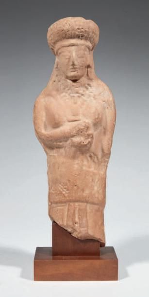 null STATUETTE FÉMININE.
Chypre, VIe-Ve siècles av. J.-C.
Grande statuette représentant...