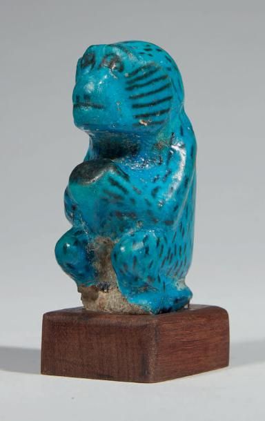 null FIGURINE DE BABOUIN.
Égypte, Moyen Empire.
Statuette représentant un babouin...