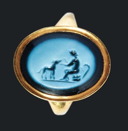 null Bague moderne sertissant une intaille ovale gravée d'un jeune satyre assis,...