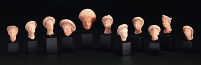 Lot composé de onze têtes de statuettes masculines...
