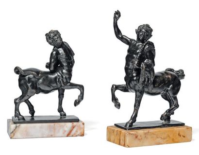 Deux centaures en bronze à patine noire....