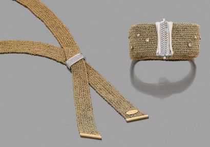 ORLANDINI DEMI-PARURE en or jaune 18K (750) tissé comprenant: un collier ruban maintenu...