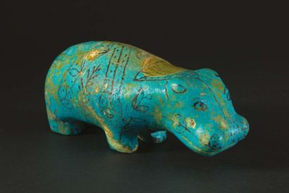 null ?STATUETTE D'HIPPOPOTAME.
Égypte, Moyen Empire.
Figurine représentant un hippopotame,...