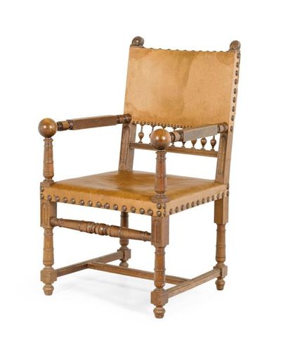 null Grand fauteuil en bois sculpté recouvert de cuir
Style renaissance flamande,...