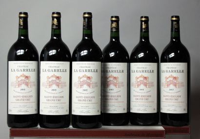 null 6 MAGNUMS CHÂTEAU LA GARELLE - St. Emilion Grand cru 2002
Caisse bois d'ori...