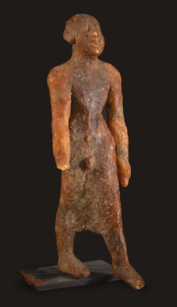 null ?STATUETTE MASCULINE.
Égypte, probablement XIe dynastie (?).
Rare statuette...