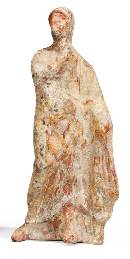 null STATUETTE DE FEMME DRAPÉE.
Art Hellénistique, ca. IIIe-IIe siècles av. J.-C.
Statuette...