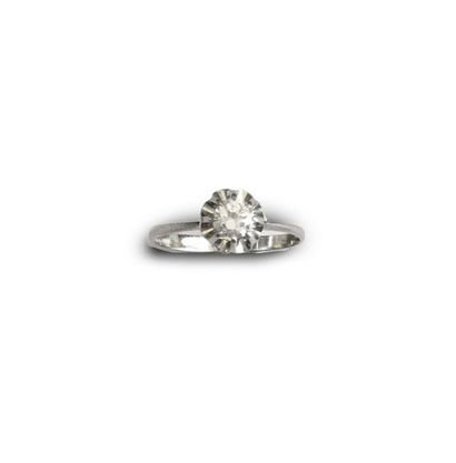 null Bague en or gris 18K (750) ornée d'un diamant brillant pesant environ 0,20 carats....