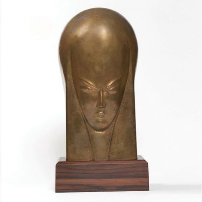 Maurice DAURAT (1880-1969) Masque de femme au front bombé
Cuivre repoussé et ébène...