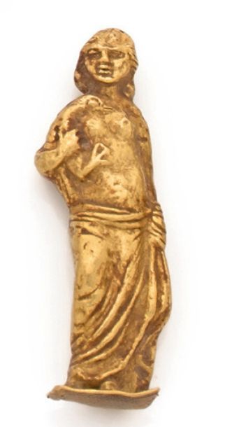 PROBABLEMENT D'ÉPOQUE ROMAINE (?). 
Figurine representant Venus debout, le torse...