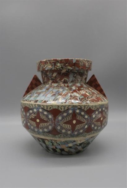 null Jean GERBINO (1876-1966) - VALLAURIS
Vase à bandeau, anses en triangle en céramique...