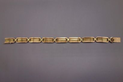 Bracelet en or jaune 18K ( 750/oo) à maillons...
