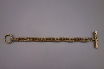 HERMÈS : Bracelet en or jaune 18K (750/oo)...