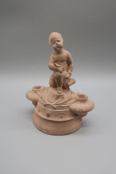 null Aime Irvoy (1824 - 1898)
Statuette en terre cuite figurant un putti reposant...